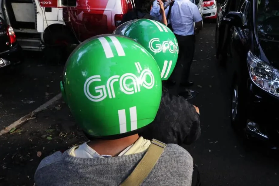 Poder, protestos e escala das plataformas: por que a Indonésia está pressionando por uma fusão entre Grab e GoTo